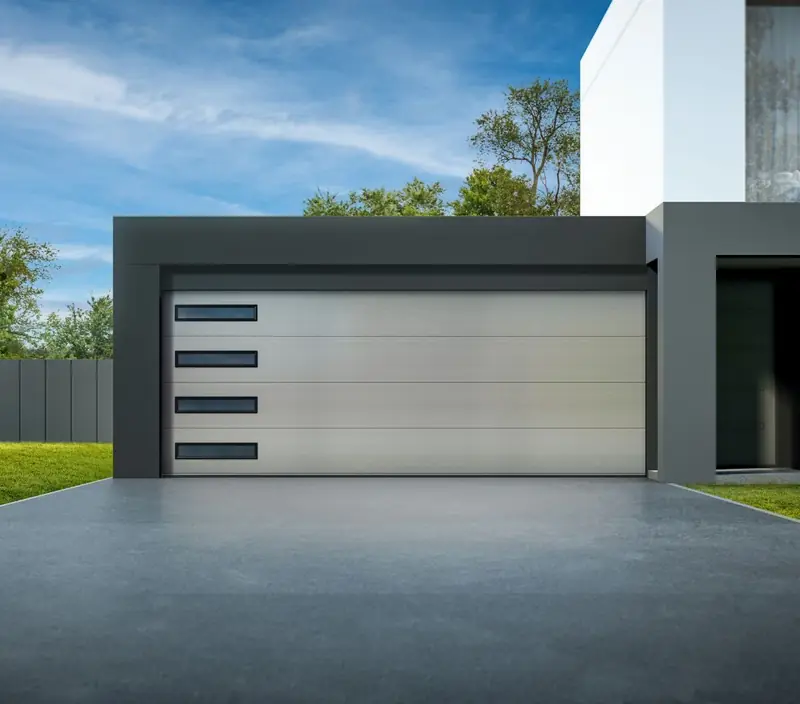 Technician performing a residential garage door tune-up